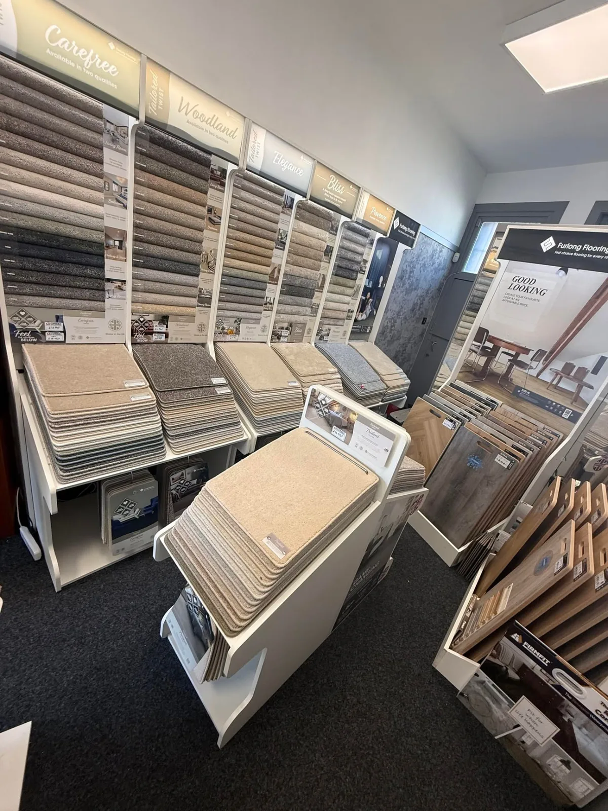 Carpet samples and wood-effect sample boards in the showroom